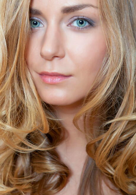 Very attractive blond teen Sharon D unveils tiny tits and spreads her legs 